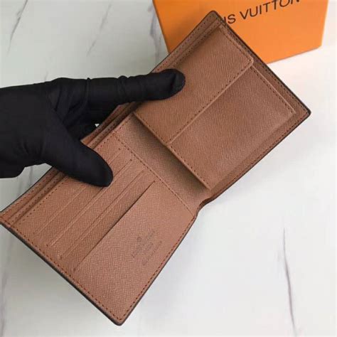 lv marco wallet real vs|louis vuitton wallet lookup.